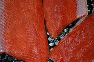 Red salmon fillets ready for the grill