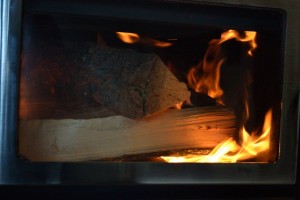 Enjoying a blaze through clean stove glass
