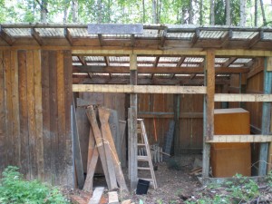 Partially deconstructed shed preparing for its move