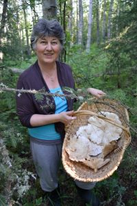 Rose with a big basketful of mushrooms